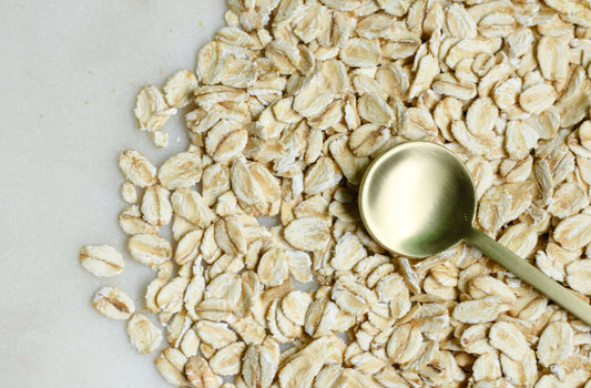 Oat flakes with a spoon